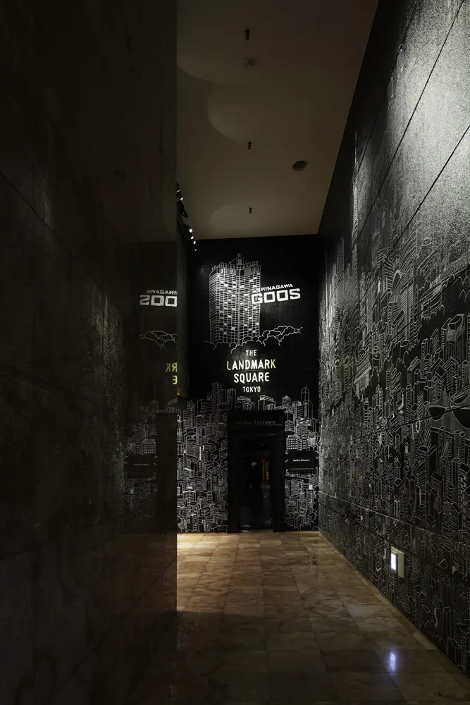 "Garden Restaurant All Day Dining" entrance. The graphic of hand-drawn cityscape of Tokyo covers the wall.