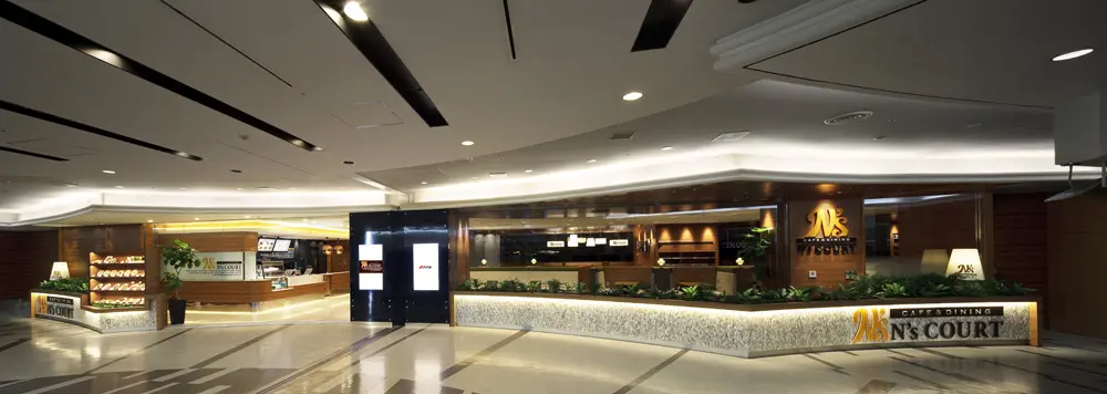 The moderately open façade creates a sense of anticipation as people enter the store, welcoming them as they pass by.