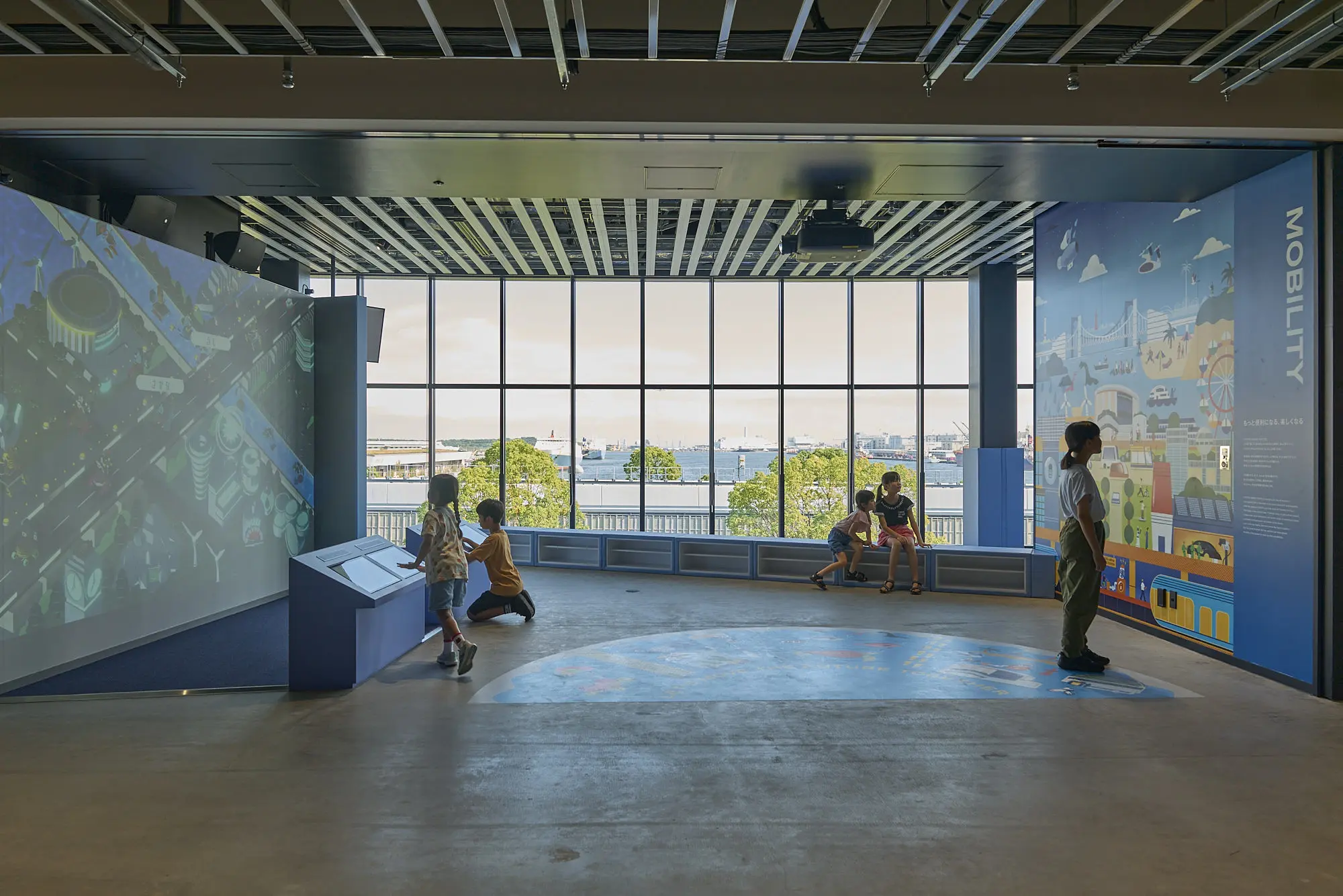 "MOBILITY KIDS AREA": A kids' space where they can imagine future mobility while looking out the window at all kinds of mobility.