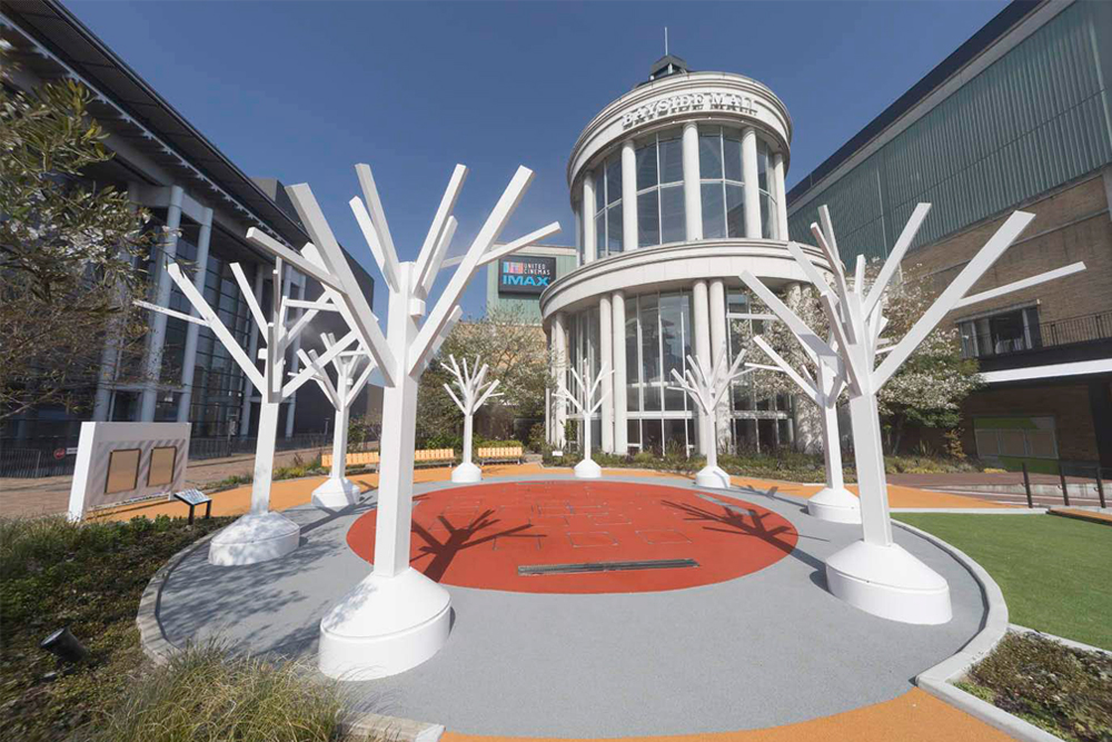 The "Tree Plaza" is the entrance to an active world. In the summer, mist comes out of the trees and fountains come out of the floor.