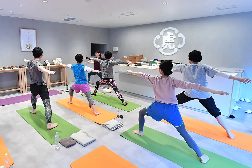 Patrons attending the regularly held yoga class. After exercising, they can enjoy Yokan and Azuki Bean Tea.