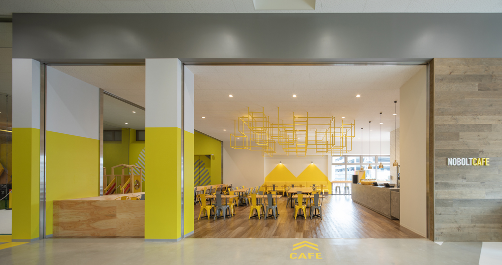 The cafe area is a space where adults can relax and watch children playing.