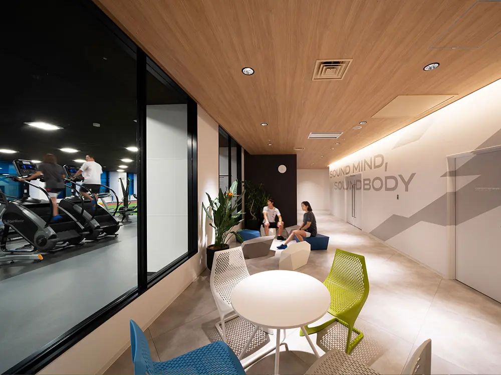 The gym-side lounge offers a space to relax.