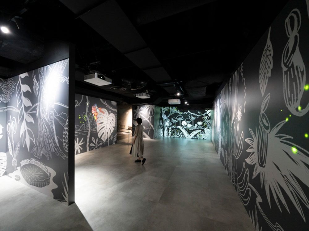 Prologue: With each step, the space transforms into another tropical world, heightening the sense of anticipation as you head into the entertainment space.