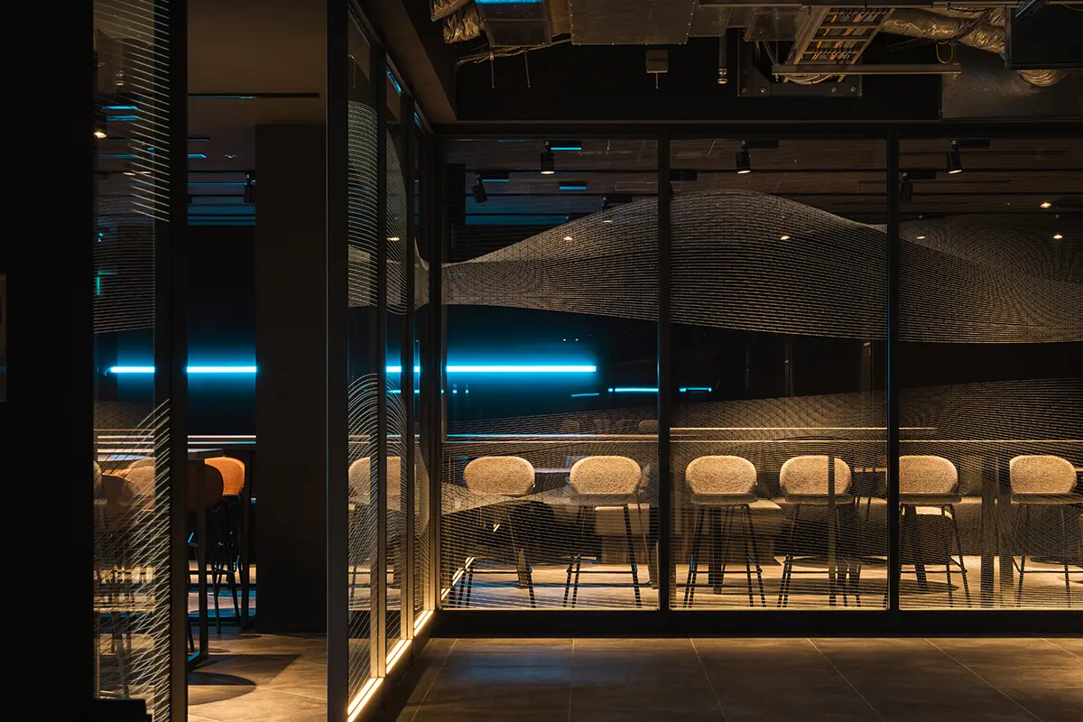 Graphics featuring a generous wave pattern inspired by Tokyo Bay