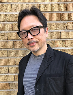 津田真