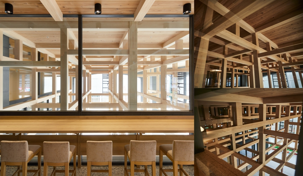 Second floor lobby: The counters surrounding the atrium overlook the scenery through the timber frame.
