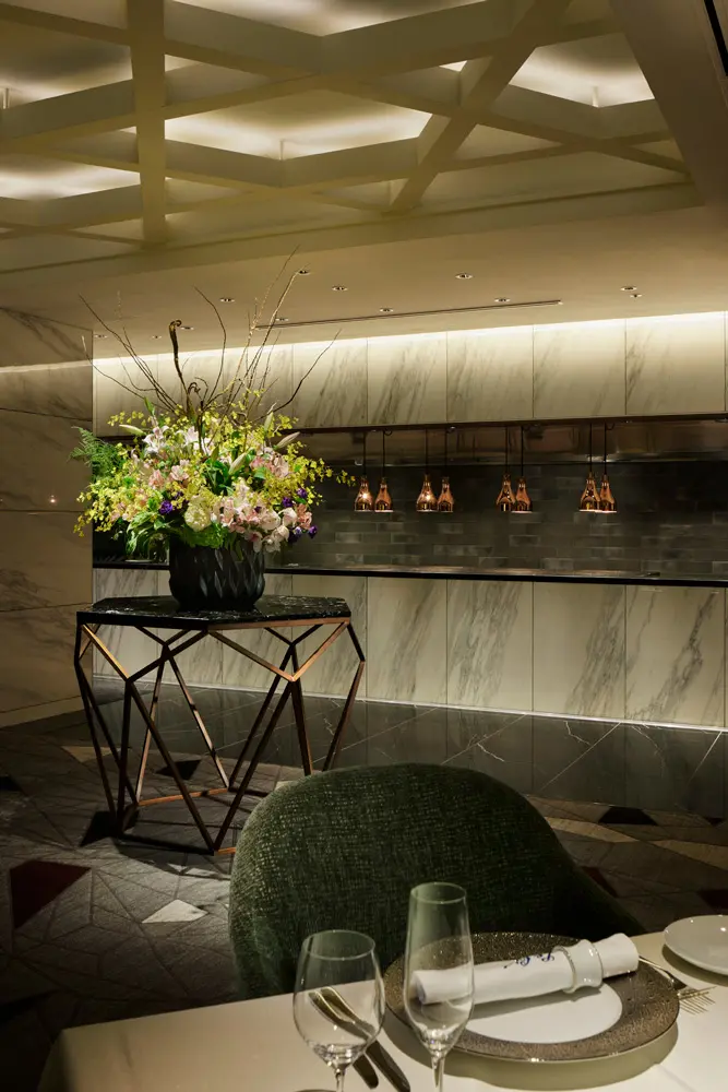 The open kitchen enhances the atmosphere and provides a rich dining experience for all generations.