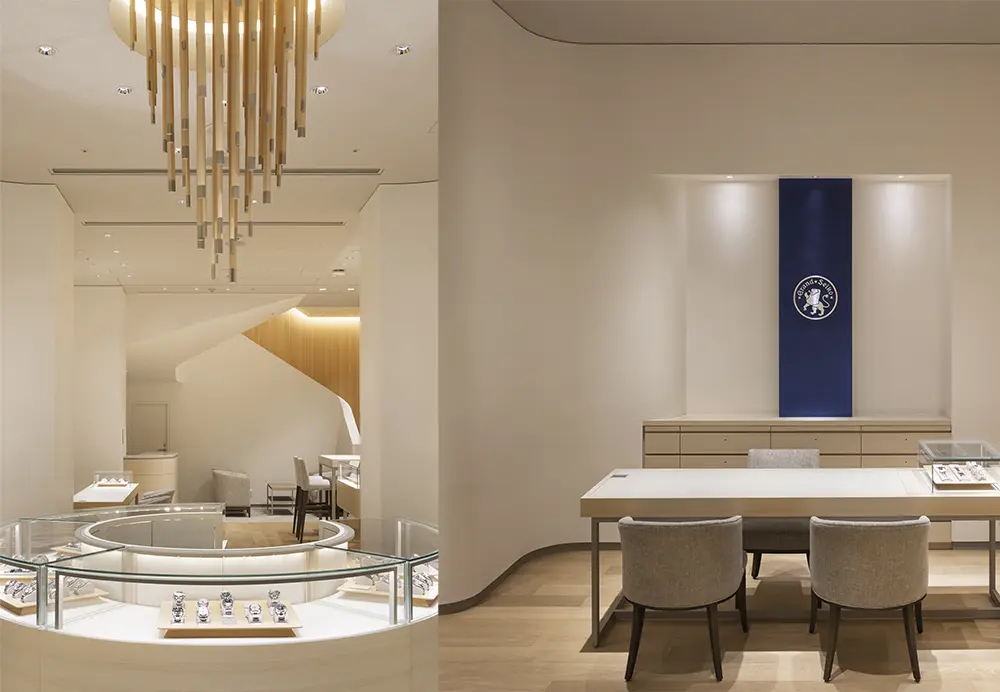 カーブする壁が切りとる店内空間は新たなブランドメッセージ「Alive in Time/今、この時を生きる人へ」の躍動感を表現