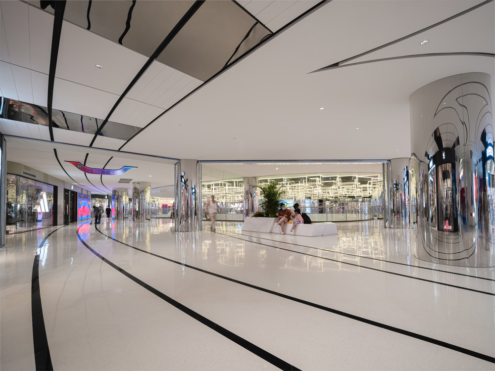 Walkway of the basement levels. Horizontal movement is encouraged through the installation of designs which emphasize a sense of unity between above and below.