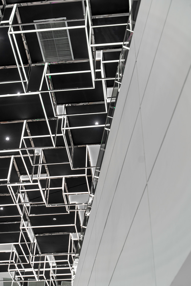 The main atrium on the basement floors. Photogenic ceiling structures consisting of glass and light design elements give the environment a futuristic ambiance.