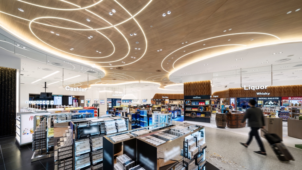 A walk-through duty-free store that envelops all departing passengers in a "comfortable sense of security" and a "premium, luxurious space that is uniquely Japanese."