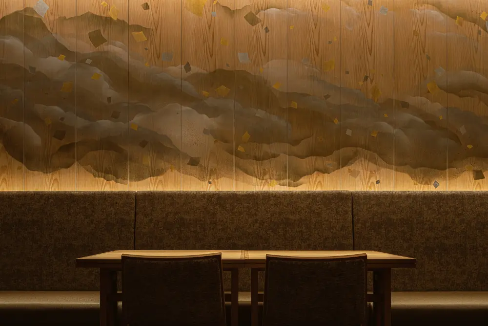 Dining area on the second floor: a spatial production combining Osaka’s ever-changing cityscape (walls) with the timeless act of eating (seats).