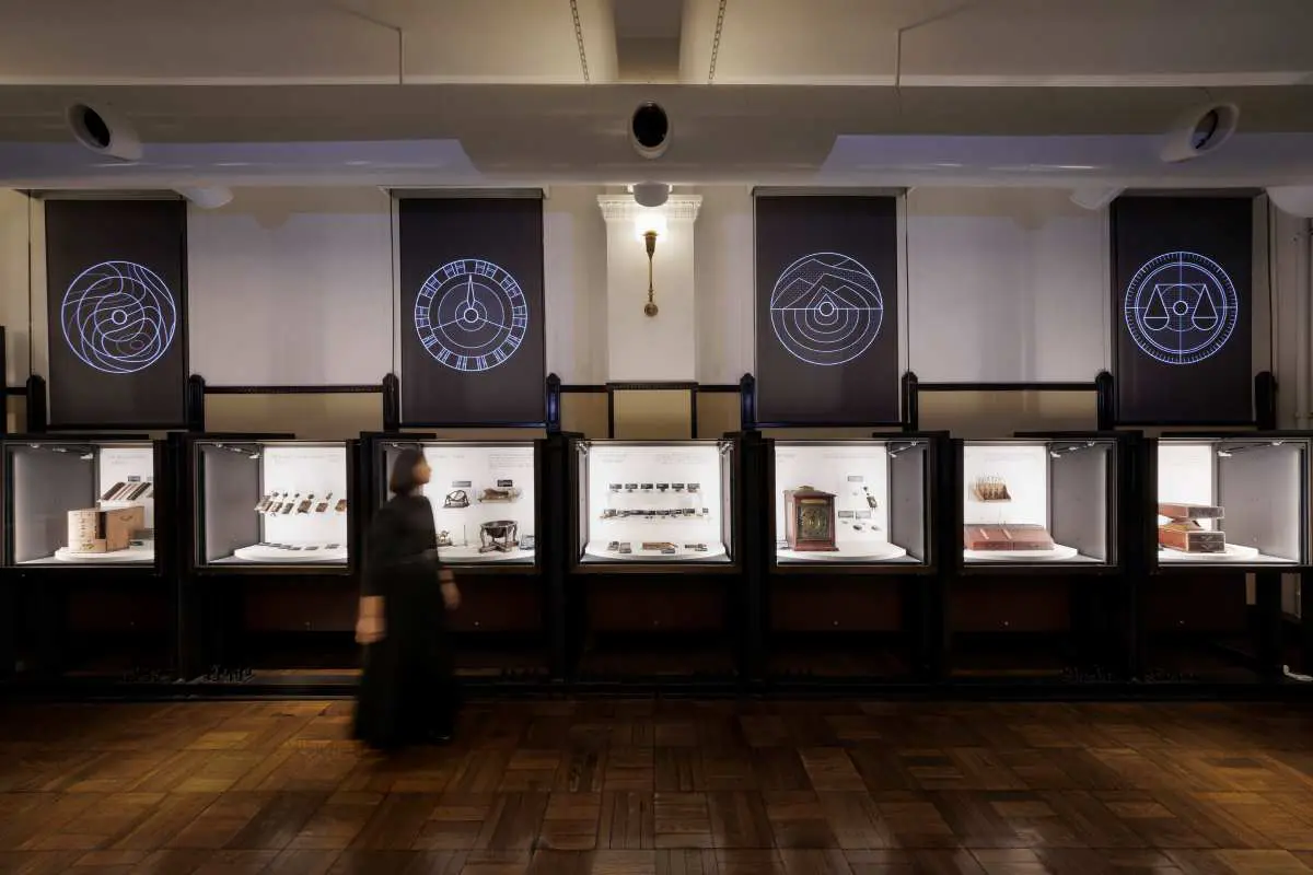 "The Marking of Time" Corner: Video designed to pique interest in the materials and a display of clock collections.