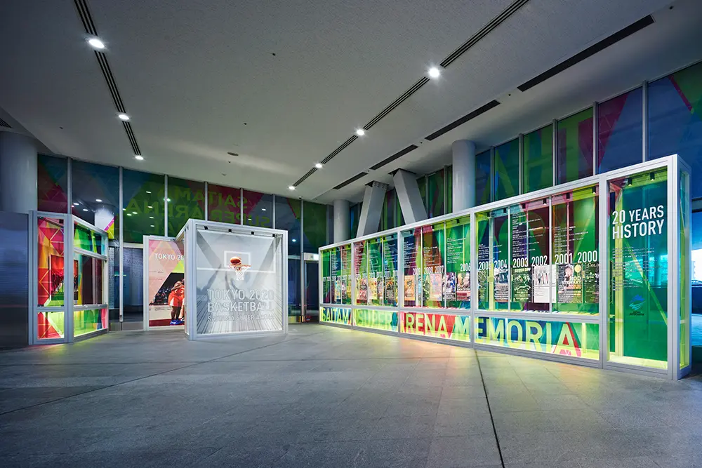 The exhibition space is divided into three zones: "Past," "Present," and "Future."